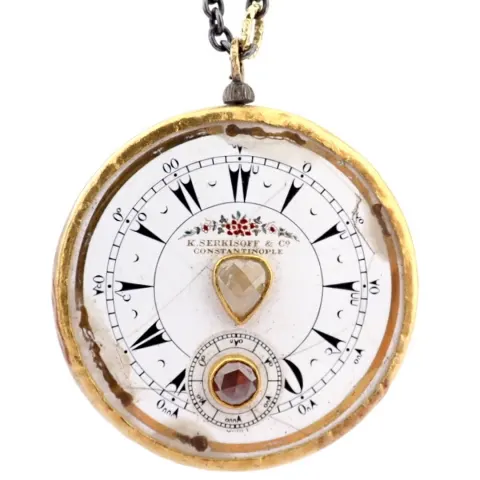 An Exquisite Necklace Made of Gold and Silver, Featuring An Antique Watch Dial Adorned With Diamonds