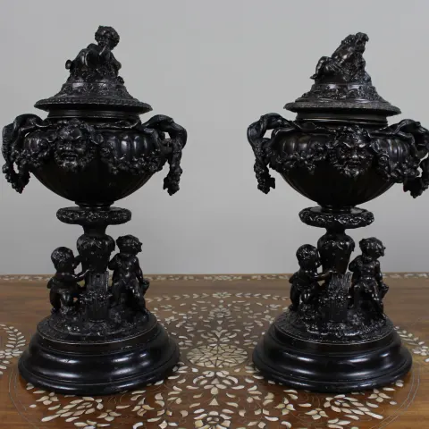 Pair of French Bronzed Spelter Urns with Bacchic Masks and Putti, Circa 1880