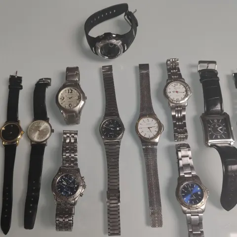 A Collection of 12 x Gents Watches.
