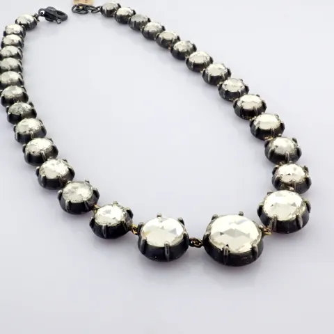 An Exquisite Necklace Detailed With Fancy Cut Topaz and Gold In Silver