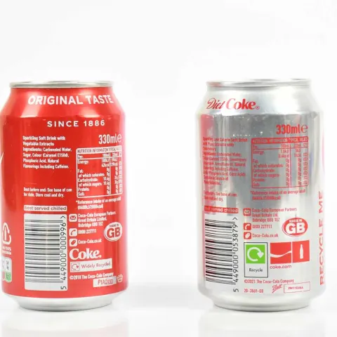 Pair of Signed Coke Cola Limited Edition Cans (With Coke) By Damien Hirst