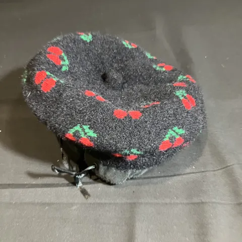 Cherry Beret worn by Florence Hall