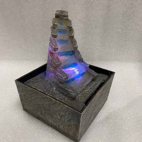Water fountain with colour changing LED