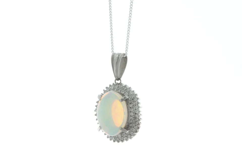 Platinum Diamond And Opal Pendant (O3.64) 0.94 Carats