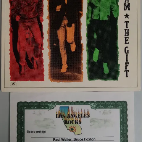 The Jam – The Gift fully autographed Vinyl record with certificate of authenticity.
