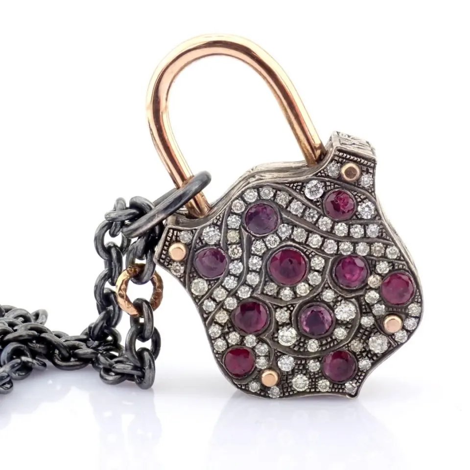 Convertible clasp necklace embellished with gold, colorful stones and diamonds on silver