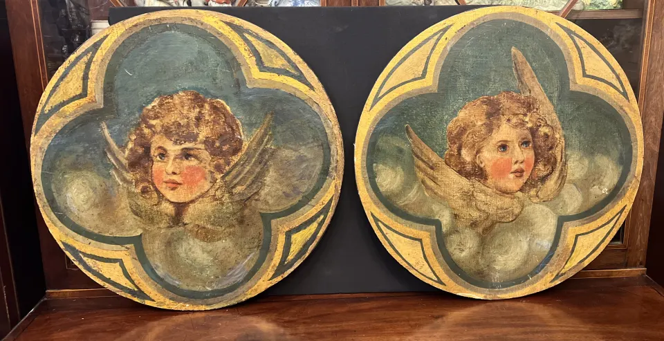 Cherub painted roundals diameter 49 cms