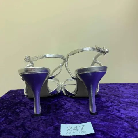 3 pairs of silver shoes