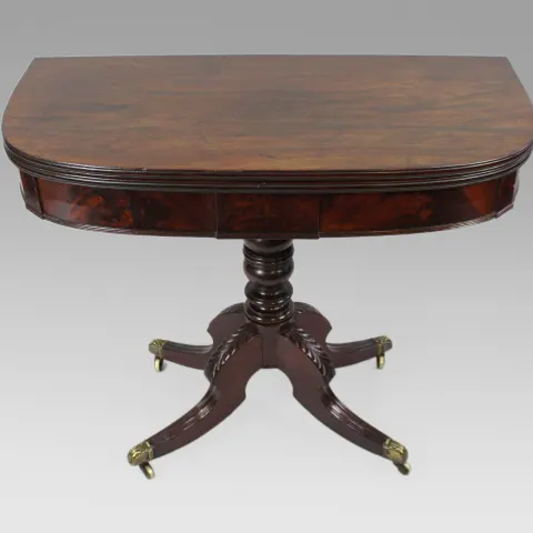 Early 19th Century English Flame Mahogany Fold-Over Tea Table