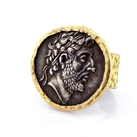 An exquisite coin ring detailed with gold and silver
