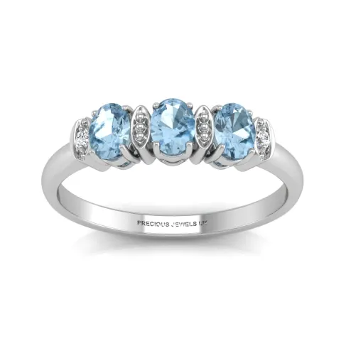 9ct White Gold Semi Eternity Diamond And Blue Topaz Ring 0.01