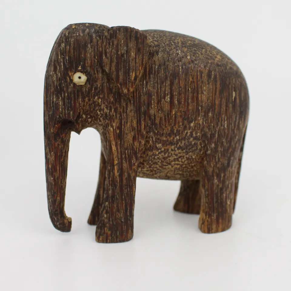 Small Carved Elephant Figurine – Possibly Palm Wood or Coconut Husk