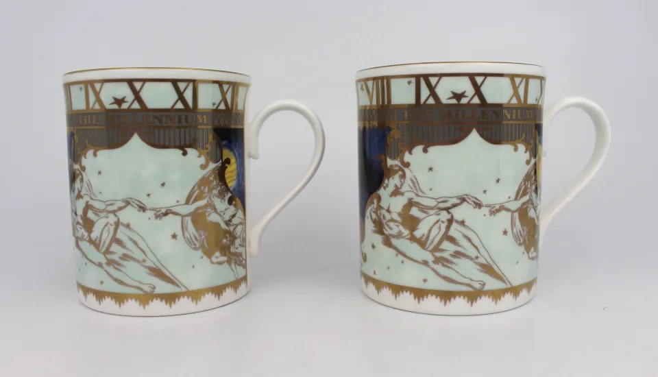 Pair of Royal Worcester Millennium Tankards