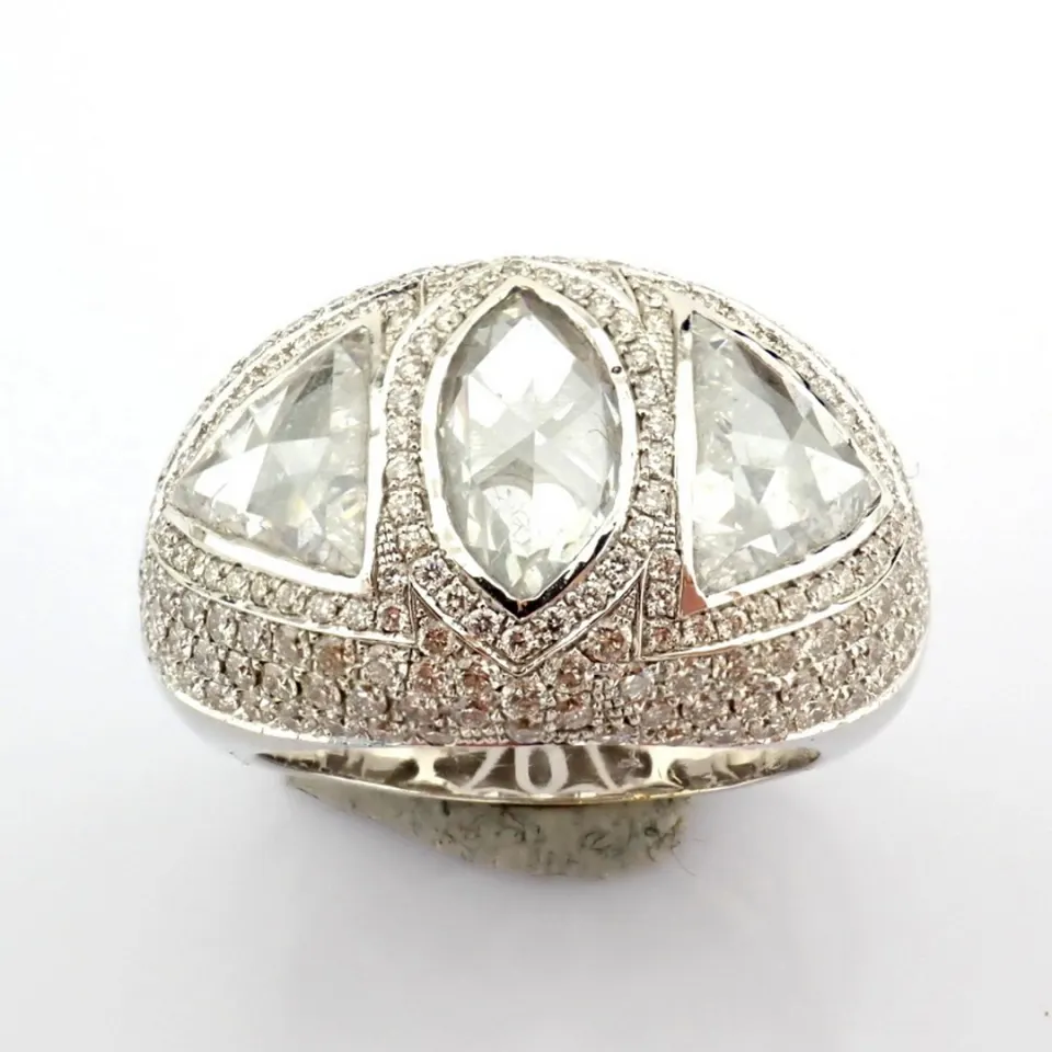 A luxurious 18k white gold ring detailed with a slightly flawed fancy cut diamonds Total 5.06 carat