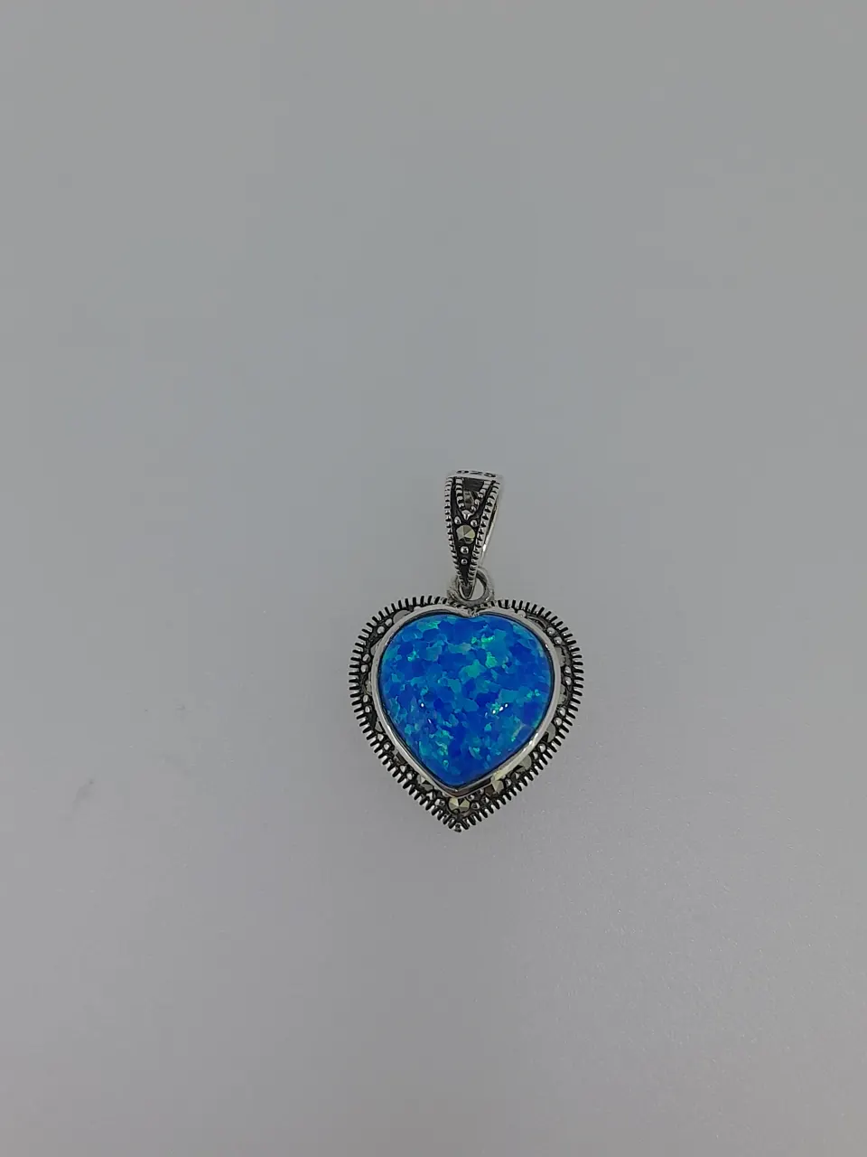 Silver Pendant Set With Synthetic Opal and Faceted Marcasite Stone