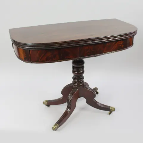 Early 19th Century English Flame Mahogany Fold-Over Tea Table