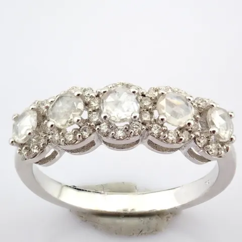An Exquisite 18K White Gold Ring Detailed With Fancy and Brilliant Cut Diamonds