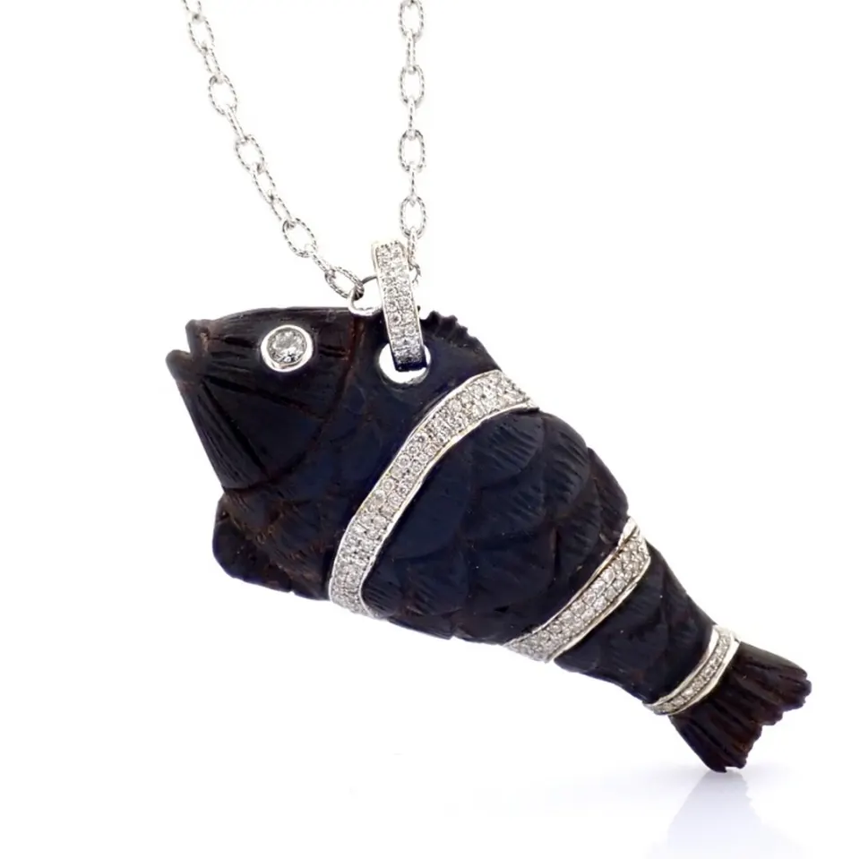 An Exquisite Ebony-Carved Fish Necklace Detailed With Brilliant Diamonds and Gold
