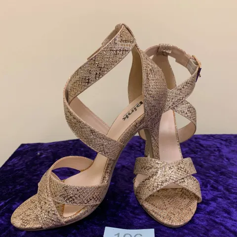 Designer shoes gold in size 35.  Code 196