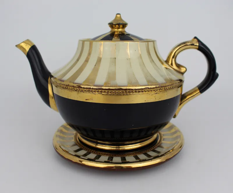 Decorative Lustre Terractotta Tea Pot on Stand