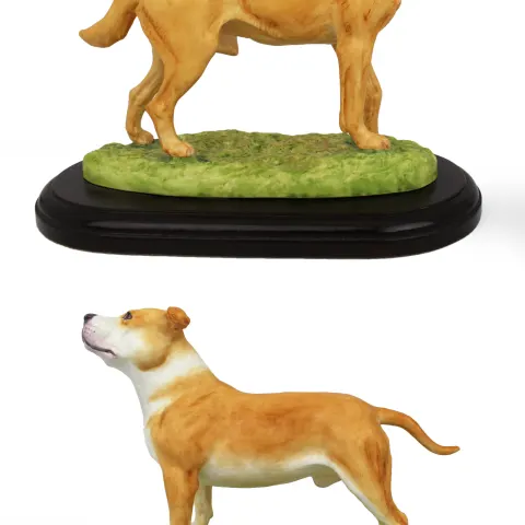 Pair of Porcelain Dogs on Plinths