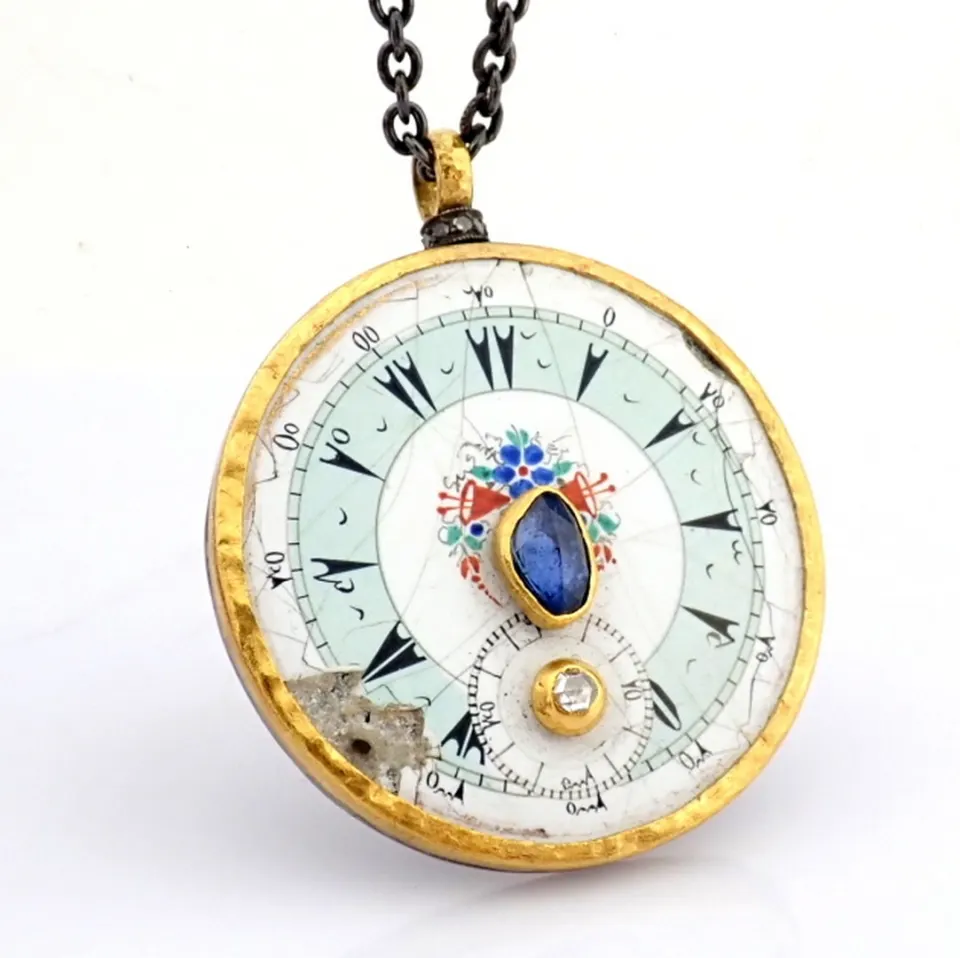 Necklace made of gold and silver, with antique watch dial with precious colorful stones and diamonds