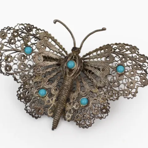 Early 20th Century Silver Filigree Butterfly Brooch with Turquoise Cabochons