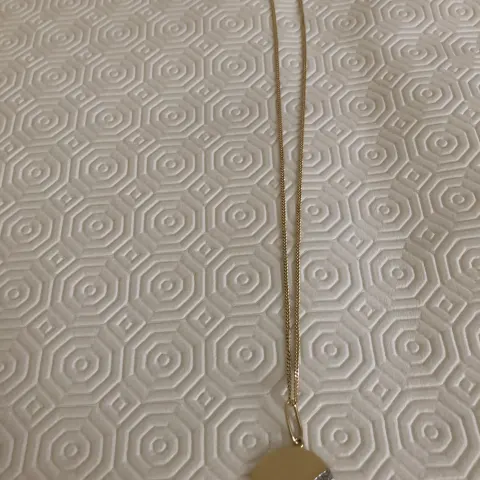 Theo Fennell 18 karat chain with pendant