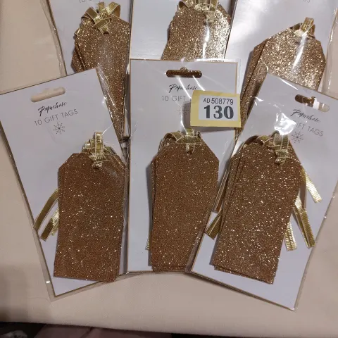 Gold glittery tags/labels.  Packs of 10.  Box of 120 packs Total RRP £180