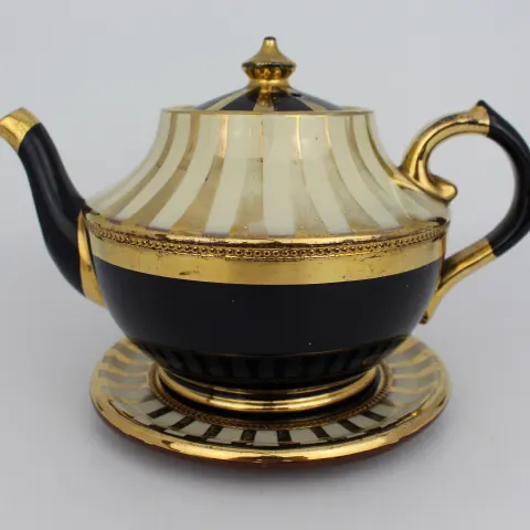 Decorative Lustre Terractotta Tea Pot on Stand