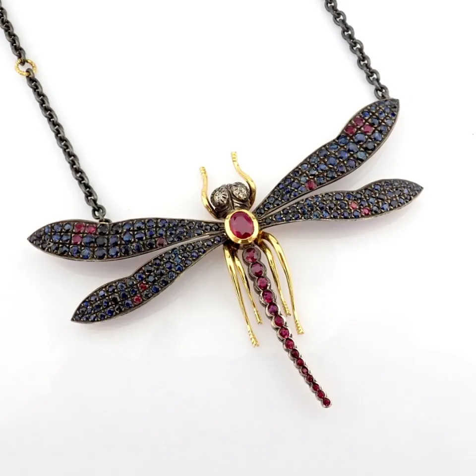 An Exquisite Necklace Intricately Detailed With Ruby, Sapphire, Brilliant Diamonds and Gold On Silve