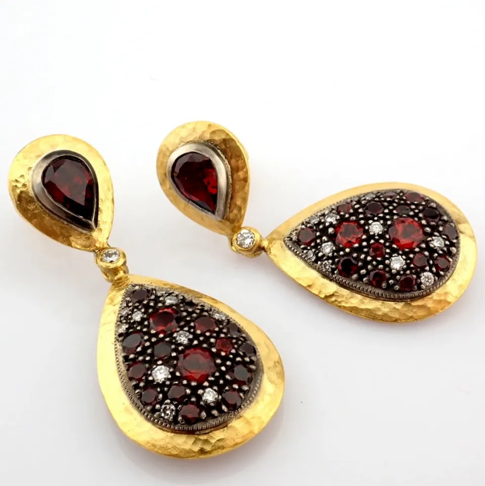 An Exquisite Earrings Detailed With Red Garnets , Brilliant Diamonds and Gold In Silver