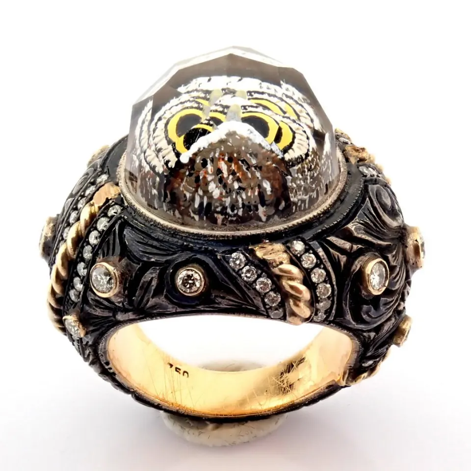 Hand-made gold&silver ring. Detailed with topaz, reversaly engraved intaglio owl and diamonds