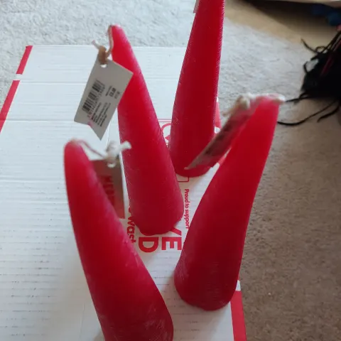Paperchase tall red cone candles.  Box of 8