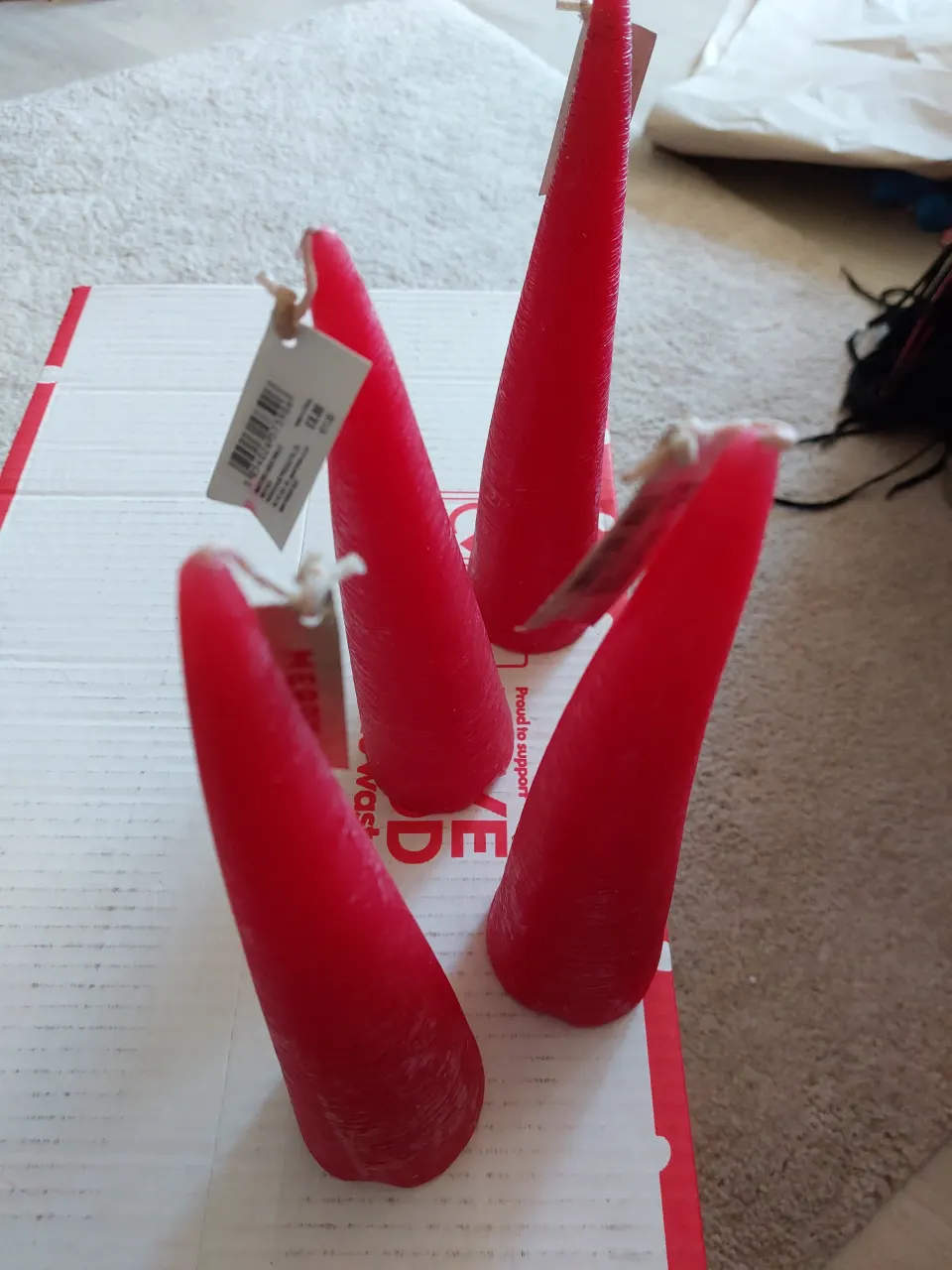 Paperchase tall red cone candles.  Box of 8