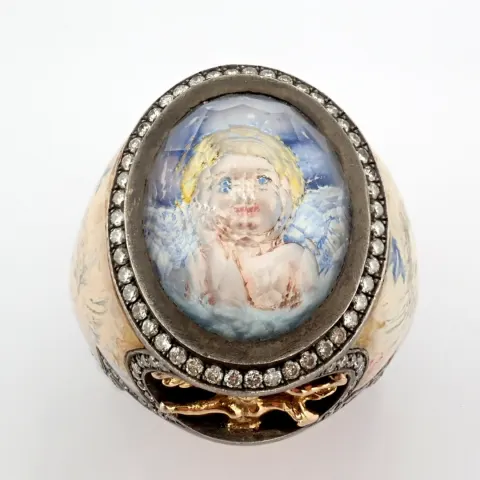 An Exquisite Handmade Ring, Intricately Detailed With Topaz, Featuring A Reverse-Engraved Intaglio o