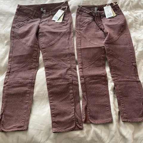 Bundle of 2 Girl's Jeans, Red With Black Stripes, Size UK 4 and UK 10