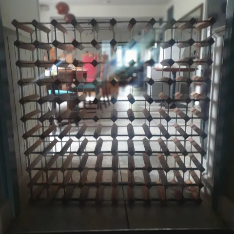 Wine rack - 110 places.  Wood and metal - expandable