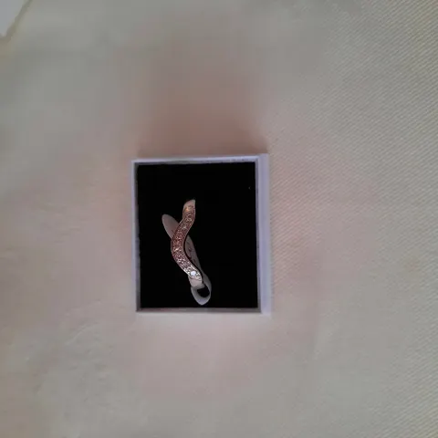 Rhodium plated set high quality CZ ring.  Size T. Code 338/0011