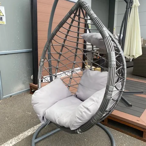 lot 6. egg chair plus stand