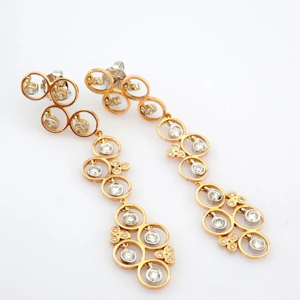 18K rose and white gold earrings detailed with brilliant diamonds