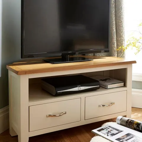 (22/2F) RRP £269. Norfolk Two Tone Corner TV Unit. Painted In A Soft Cream Colour With Contrasting
