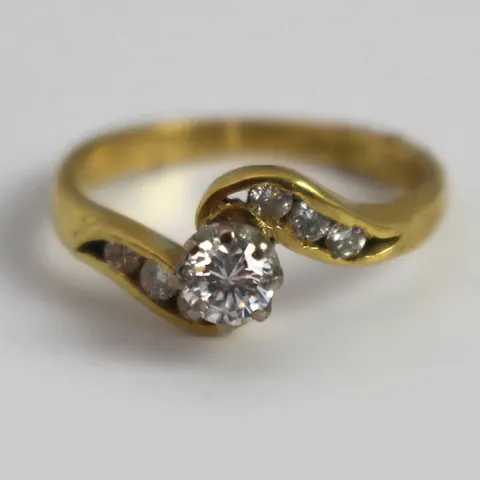 Diamond Single Stone Crossover Twist Yellow Gold Ring