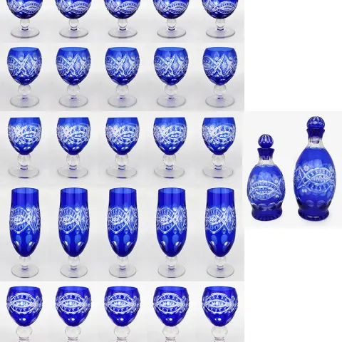 Suite of Blue Overlay Crystal Glasses & Decanters