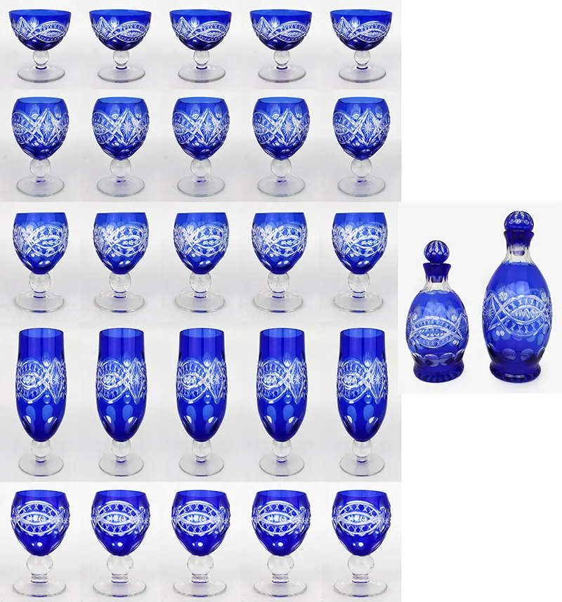 Suite of Blue Overlay Crystal Glasses & Decanters