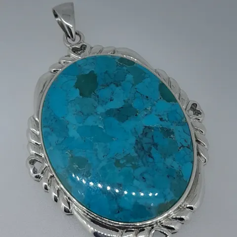 Silver and Reconstituted Turquoise Oval Pendant