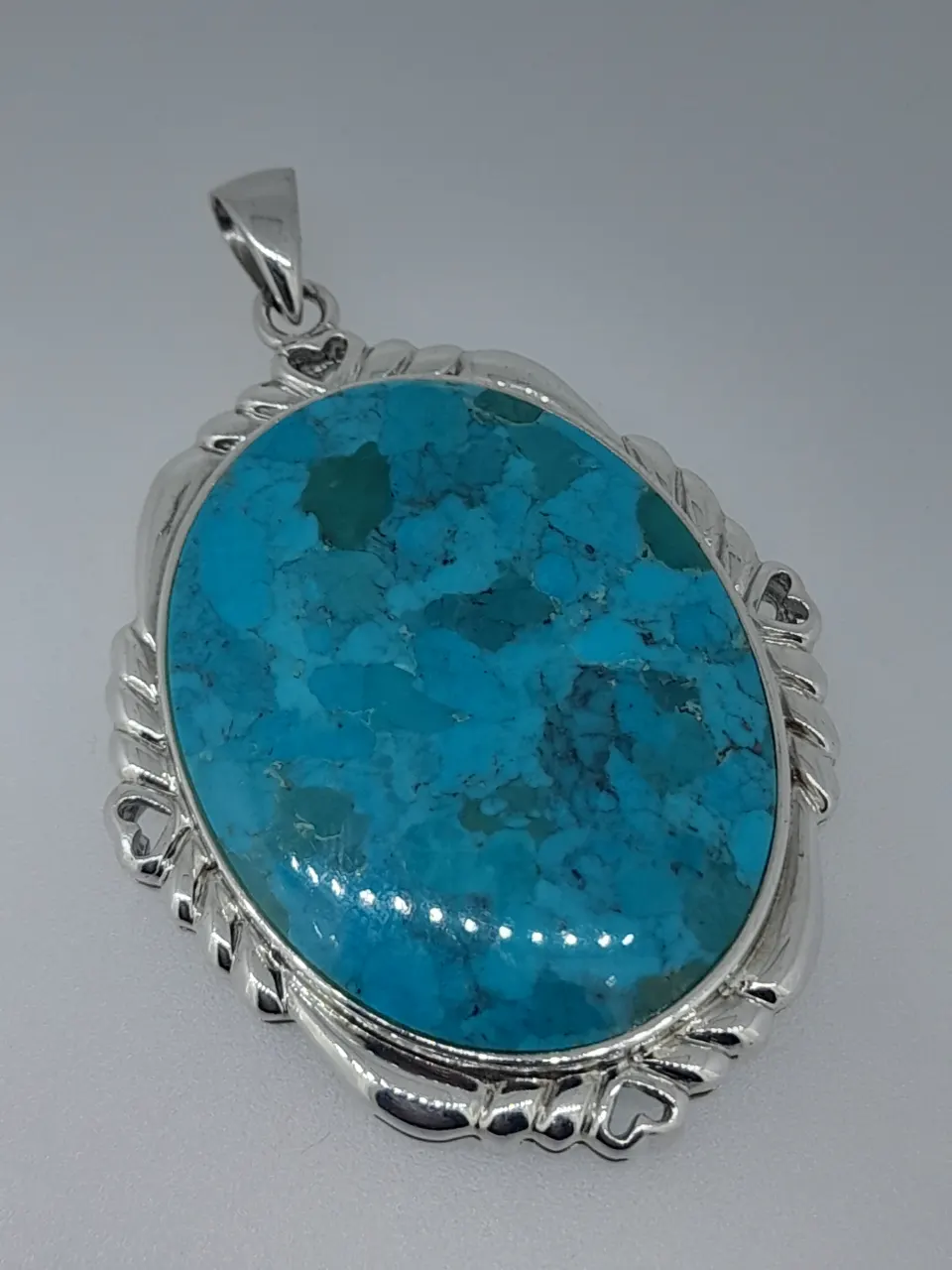 Silver and Reconstituted Turquoise Oval Pendant