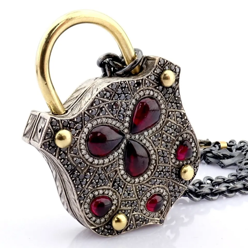 Convertible clasp necklace embellished with gold, colorful stones, and diamonds on silver