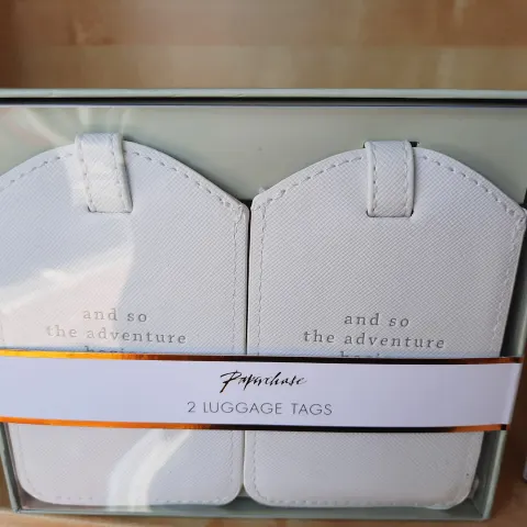 2 passport holders & 2 labels