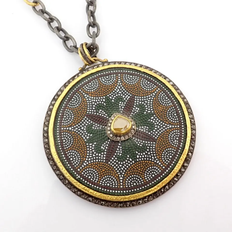 An exquisite necklace detailed with micro-mozaic, brilliant diamonds and gold on silver